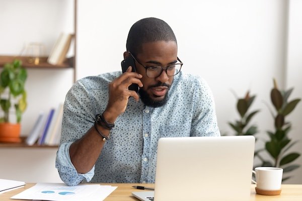 Person booking an appointment via phone call